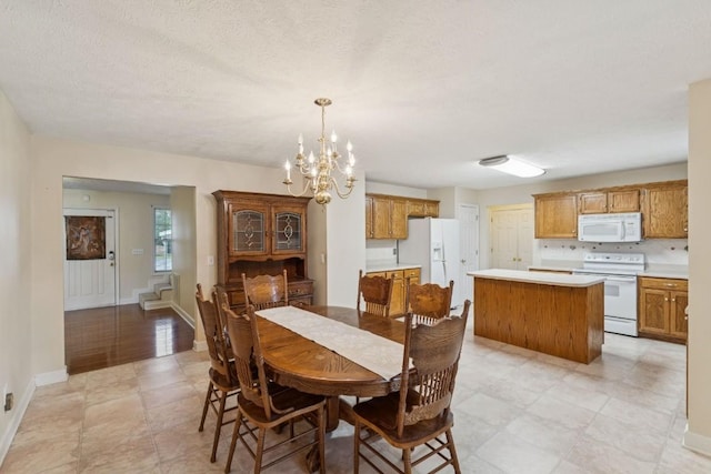 1011 Shirley Dr, Lebanon, TN 37087 - dining space featuring a chandelier and baseboards