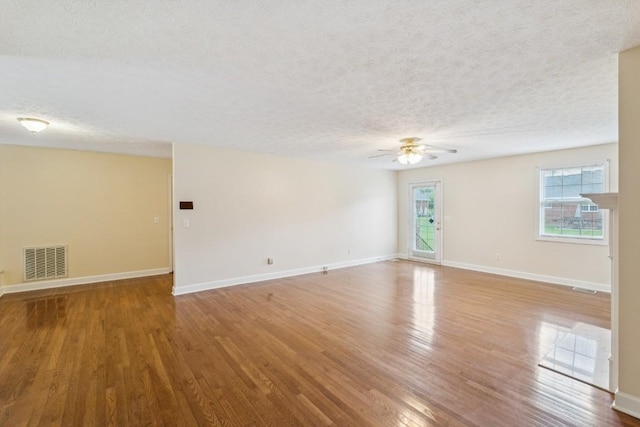 1011 Shirley Dr, Lebanon, TN 37087 - spare room with a ceiling fan, a textured ceiling, and wood finished floors