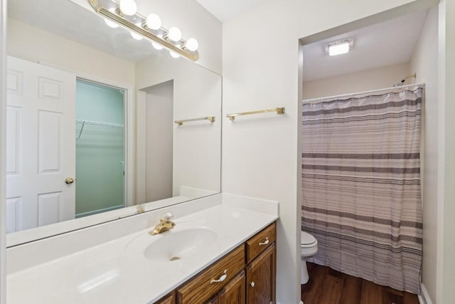 1011 Shirley Dr, Lebanon, TN 37087 - full bathroom with vanity, wood finished floors, and a shower with curtain