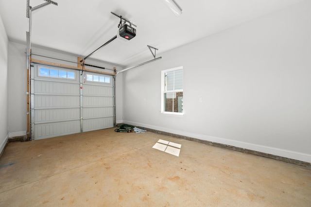 516 Rohan Dr, Murfreesboro, TN 37129 - garage with a garage door opener and baseboards