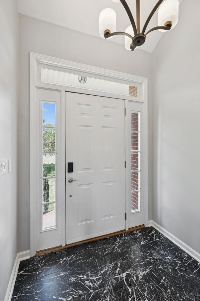 131 E Robertson Rd, Castalian Springs, TN 37031 - entrance foyer with marble look tiles and a chandelier