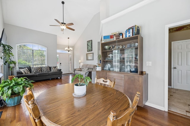 131 E Robertson Rd, Castalian Springs, TN 37031 - dining area with ceiling fan, wood finished floors, high vaulted ceiling, and a chandelier