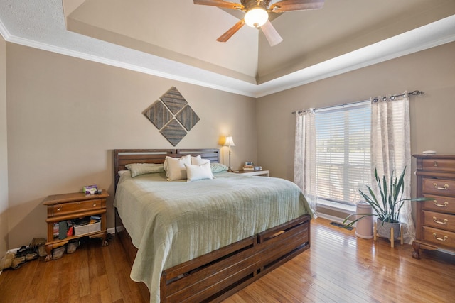 131 E Robertson Rd, Castalian Springs, TN 37031 - bedroom featuring a raised ceiling, wood finished floors, crown molding, and a ceiling fan