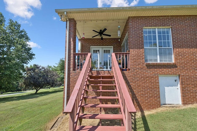 131 E Robertson Rd, Castalian Springs, TN 37031 - entrance to property with a ceiling fan, a lawn, brick siding, and french doors