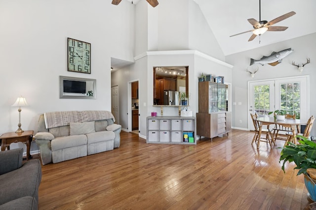 131 E Robertson Rd, Castalian Springs, TN 37031 - living area featuring a ceiling fan, high vaulted ceiling, and hardwood / wood-style flooring