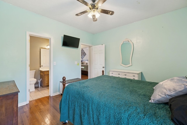 131 E Robertson Rd, Castalian Springs, TN 37031 - bedroom with hardwood / wood-style floors, ensuite bathroom, and ceiling fan
