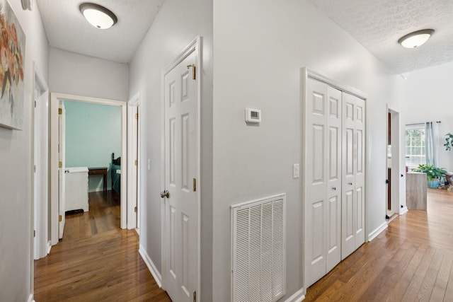 131 E Robertson Rd, Castalian Springs, TN 37031 - corridor featuring wood finished floors and a textured ceiling
