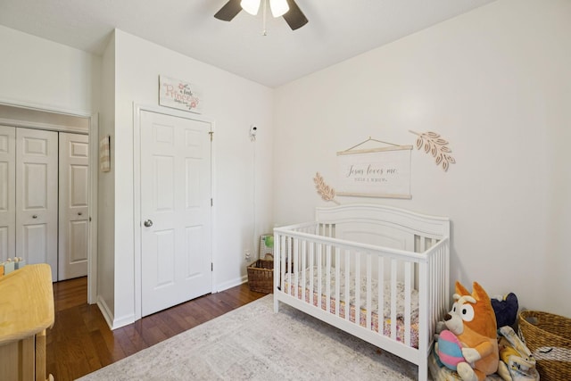 131 E Robertson Rd, Castalian Springs, TN 37031 - bedroom featuring wood finished floors, a crib, a ceiling fan, and a closet