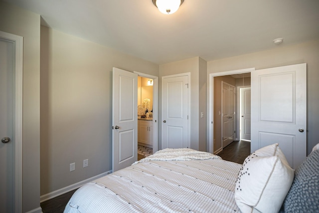 225 Tara Ct Unit 225, Columbia, TN 38401 - bedroom with dark wood finished floors and connected bathroom
