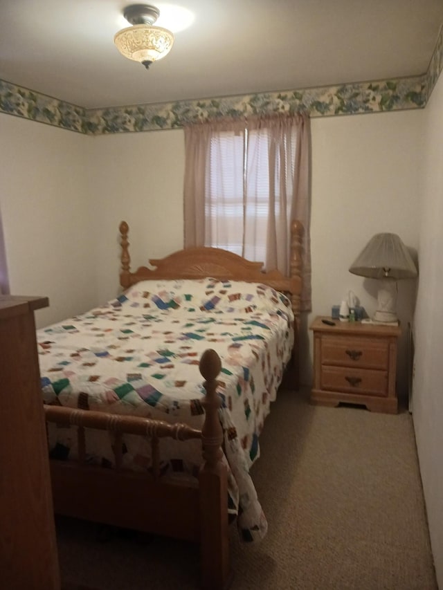 197 Stigall St, Camden, TN 38320 - bedroom featuring carpet flooring
