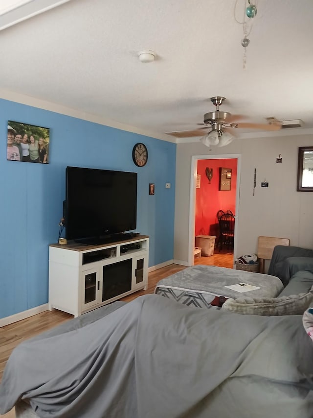 197 Stigall St, Camden, TN 38320 - bedroom featuring wood finished floors, crown molding, and a ceiling fan