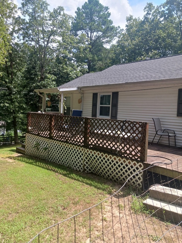 197 Stigall St, Camden, TN 38320 - rear view of property featuring roof with shingles