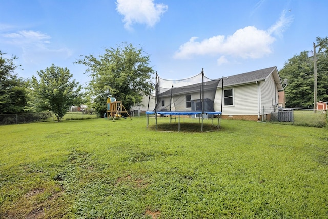 561 Danielle Dr, Clarksville, TN 37042 - fenced backyard with a trampoline and a playground