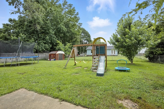 561 Danielle Dr, Clarksville, TN 37042 - fenced backyard featuring a trampoline, a storage unit, and a playground