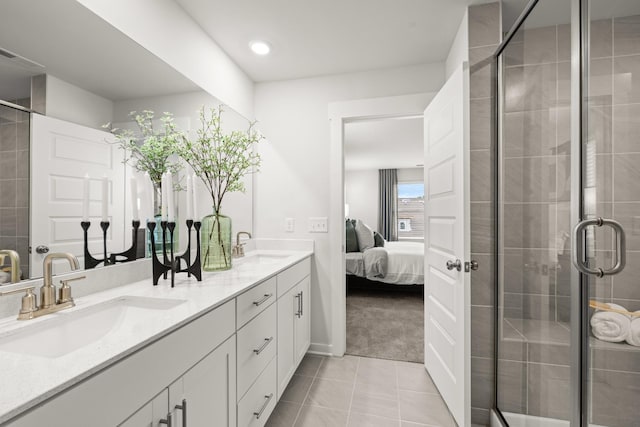 3412 Shigo St, Murfreesboro, TN 37130 - full bath with double vanity, ensuite bath, tile patterned flooring, a shower stall, and recessed lighting