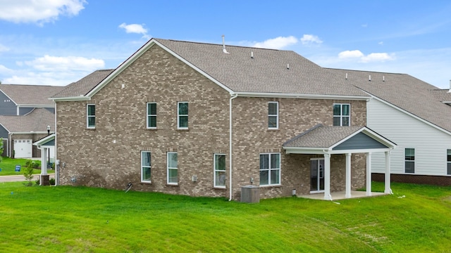 3412 Shigo St, Murfreesboro, TN 37130 - back of property with brick siding, a patio area, and a yard