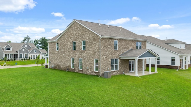 3412 Shigo St, Murfreesboro, TN 37130 - back of house featuring brick siding, a yard, and a patio