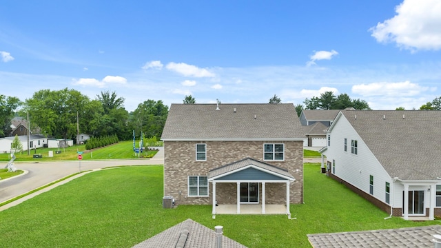 3412 Shigo St, Murfreesboro, TN 37130 - back of house with brick siding, a patio, and a lawn