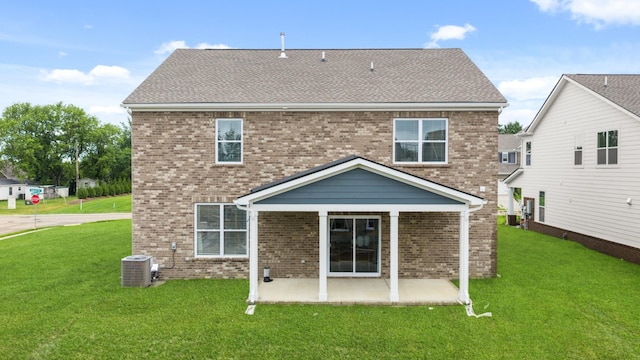 3412 Shigo St, Murfreesboro, TN 37130 - back of house featuring brick siding, a patio area, a lawn, and roof with shingles