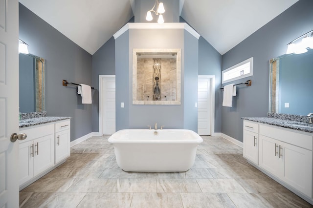 2331 Lionheart Dr, Murfreesboro, TN 37130 - full bath featuring vaulted ceiling, two vanities, a freestanding bath, and a tile shower