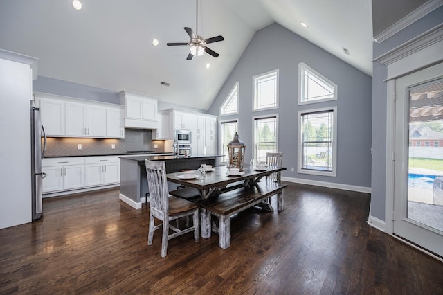 2331 Lionheart Dr, Murfreesboro, TN 37130 - dining room with ceiling fan, plenty of natural light, high vaulted ceiling, dark wood-style flooring, and recessed lighting
