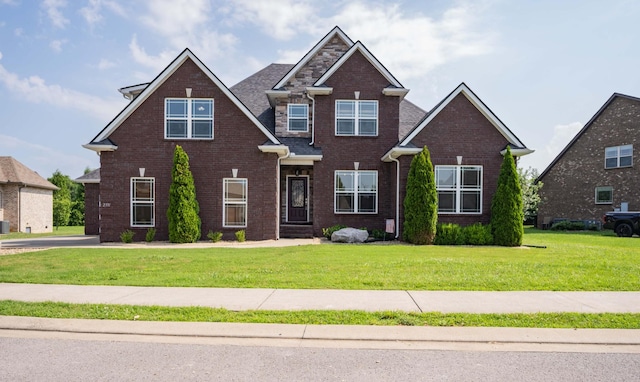 2331 Lionheart Dr, Murfreesboro, TN 37130 - craftsman-style home with brick siding and a front lawn