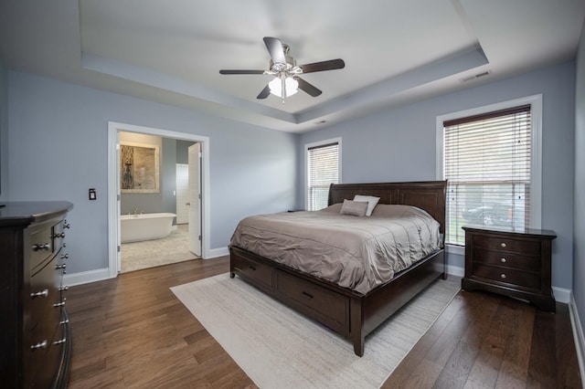 2331 Lionheart Dr, Murfreesboro, TN 37130 - bedroom with a raised ceiling, dark wood finished floors, ensuite bathroom, and ceiling fan