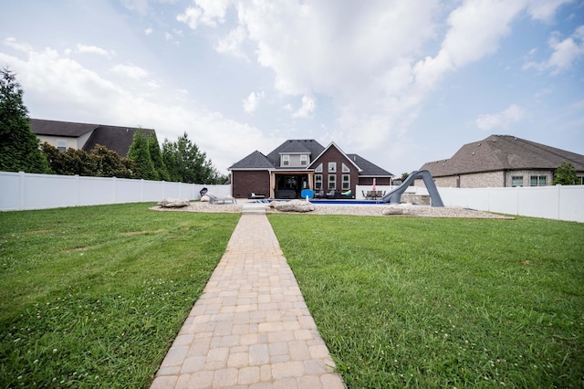 2331 Lionheart Dr, Murfreesboro, TN 37130 - rear view of property with an outdoor fire pit, a fenced backyard, and a patio
