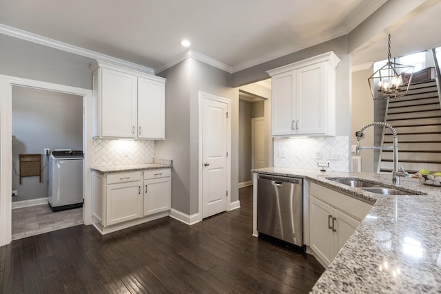 7156 Triple Crown Ln, Fairview, TN 37062 - kitchen with dishwasher, washer / clothes dryer, light stone countertops, white cabinetry, and ornamental molding