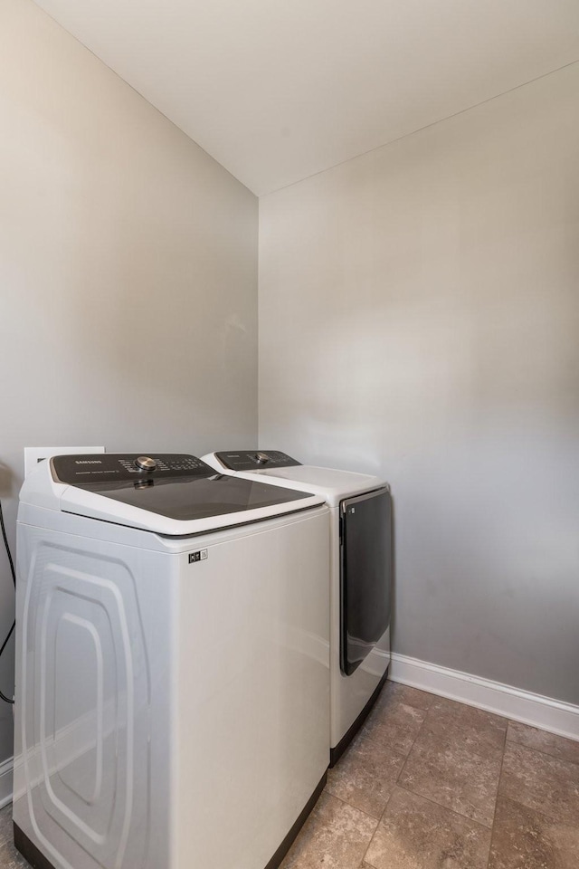 7156 Triple Crown Ln, Fairview, TN 37062 - laundry room featuring separate washer and dryer and baseboards
