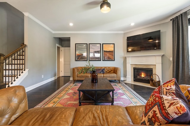 7156 Triple Crown Ln, Fairview, TN 37062 - living area featuring wood finished floors, stairs, a fireplace with flush hearth, ornamental molding, and recessed lighting