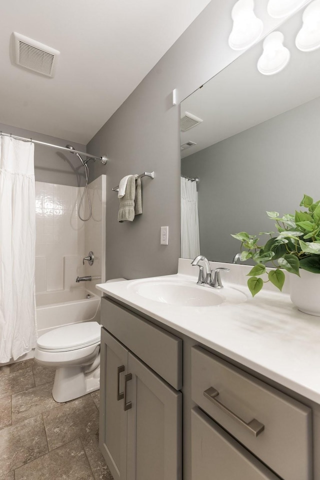7156 Triple Crown Ln, Fairview, TN 37062 - bathroom with vanity, shower / bath combo with shower curtain, and stone tile floors