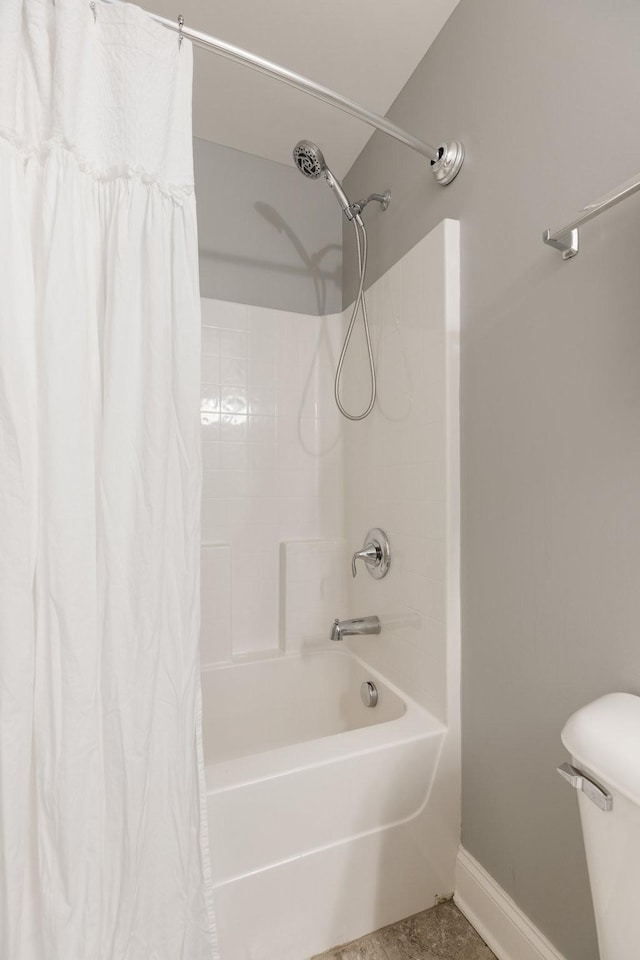 7156 Triple Crown Ln, Fairview, TN 37062 - full bathroom featuring shower / bath combo and baseboards
