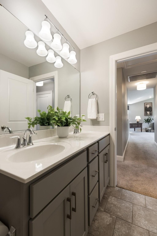 7156 Triple Crown Ln, Fairview, TN 37062 - bathroom featuring double vanity and stone finish flooring