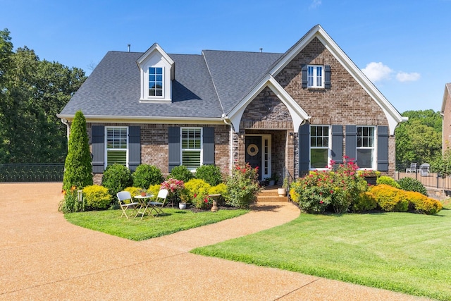 7156 Triple Crown Ln, Fairview, TN 37062 - view of front of house with roof with shingles and brick siding