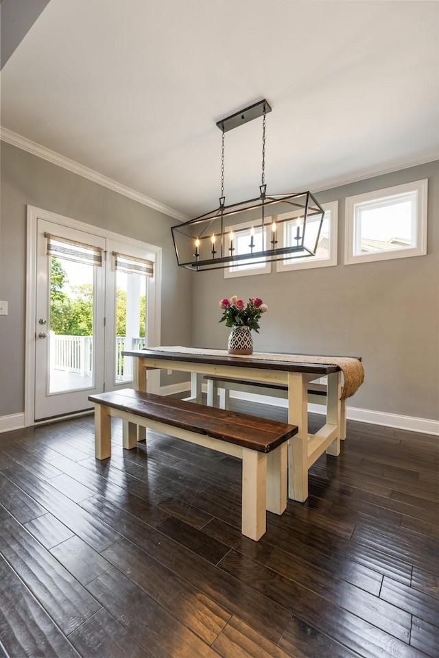 7156 Triple Crown Ln, Fairview, TN 37062 - dining area featuring ornamental molding, dark wood finished floors, and a chandelier