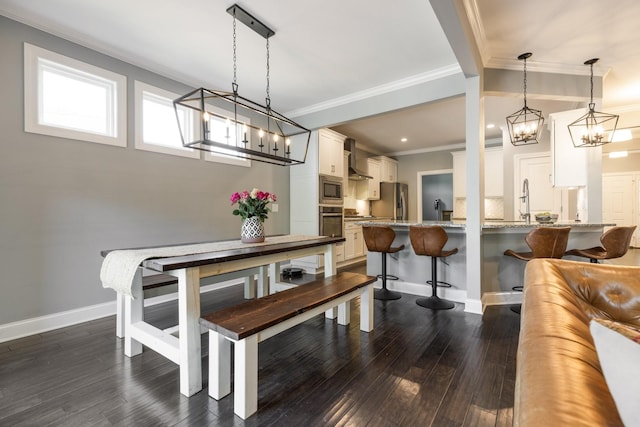 7156 Triple Crown Ln, Fairview, TN 37062 - dining space featuring a chandelier, crown molding, and dark wood-style flooring