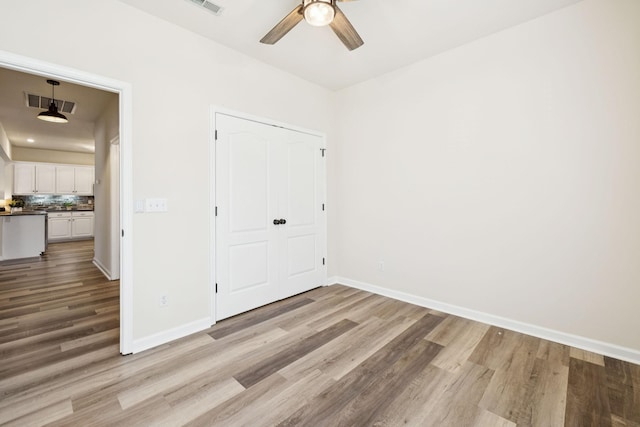 2414 Keegan Dr, Murfreesboro, TN 37130 - unfurnished bedroom featuring light wood-type flooring and ceiling fan