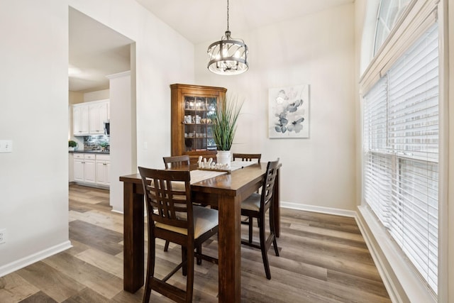 2414 Keegan Dr, Murfreesboro, TN 37130 - dining space with a chandelier and light wood-style flooring