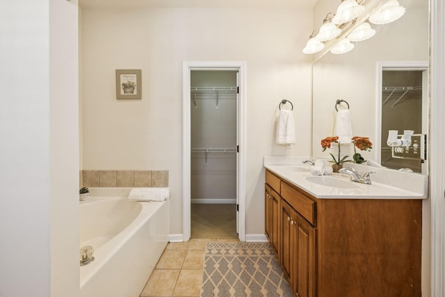 2414 Keegan Dr, Murfreesboro, TN 37130 - full bath with a bath, double vanity, tile patterned flooring, a chandelier, and a spacious closet