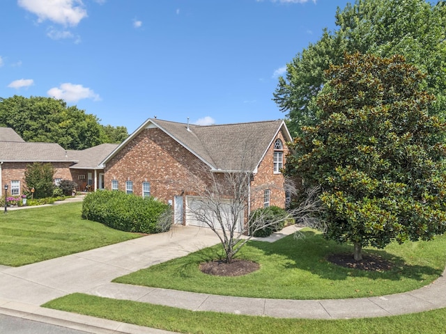 2414 Keegan Dr, Murfreesboro, TN 37130 - view of property exterior featuring brick siding, concrete driveway, a lawn, and roof with shingles