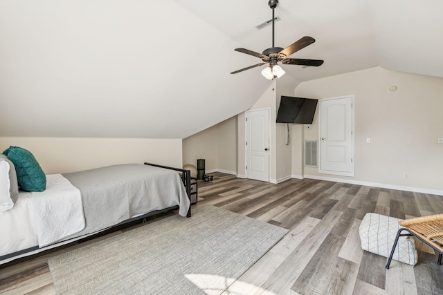 2414 Keegan Dr, Murfreesboro, TN 37130 - bedroom with wood finished floors, vaulted ceiling, and a ceiling fan