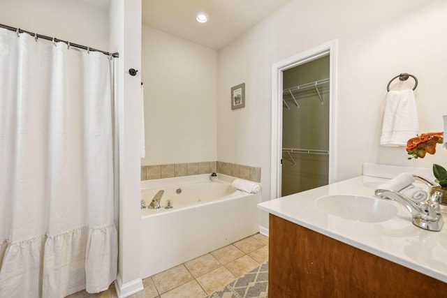 2414 Keegan Dr, Murfreesboro, TN 37130 - bathroom with a bath, vanity, tile patterned flooring, a spacious closet, and a shower with curtain