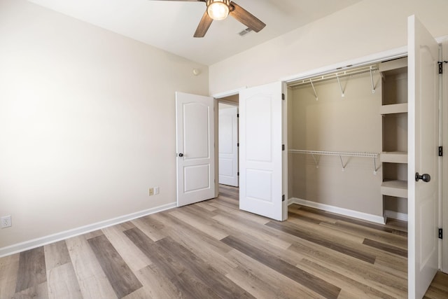 2414 Keegan Dr, Murfreesboro, TN 37130 - unfurnished bedroom featuring wood finished floors, a closet, and a ceiling fan
