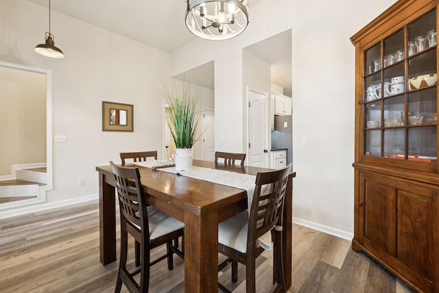 2414 Keegan Dr, Murfreesboro, TN 37130 - dining room featuring wood finished floors and a chandelier