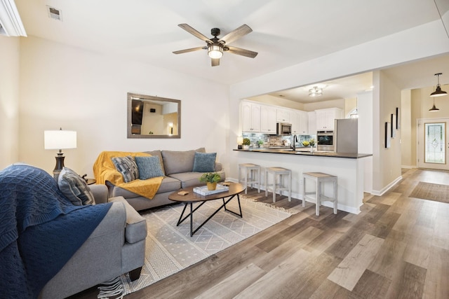 2414 Keegan Dr, Murfreesboro, TN 37130 - living area featuring light wood-style flooring and a ceiling fan