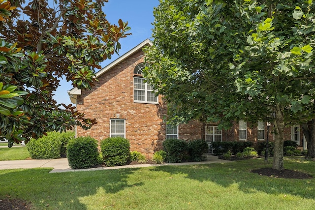 2414 Keegan Dr, Murfreesboro, TN 37130 - view of side of property with a yard and brick siding