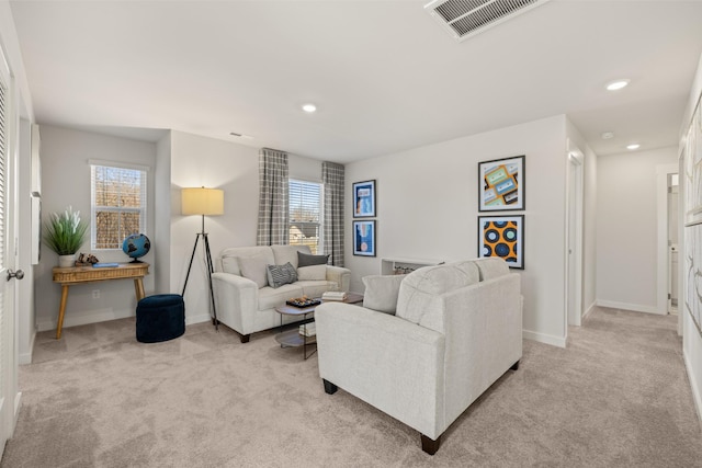 1243 Tucker Dr, Lebanon, TN 37087 - living room featuring light colored carpet, healthy amount of natural light, and recessed lighting