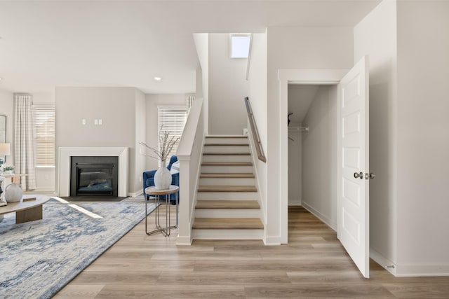 1243 Tucker Dr, Lebanon, TN 37087 - stairs with wood finished floors and a fireplace with flush hearth