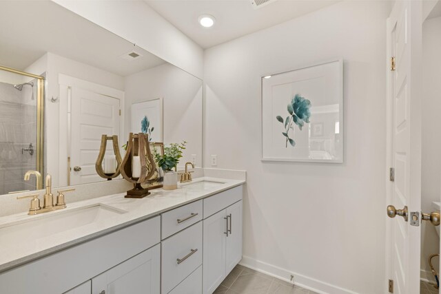 1243 Tucker Dr, Lebanon, TN 37087 - full bathroom with double vanity, a stall shower, and tile patterned floors